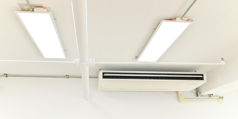 The ventilation system is on the ceiling of the school corridor.