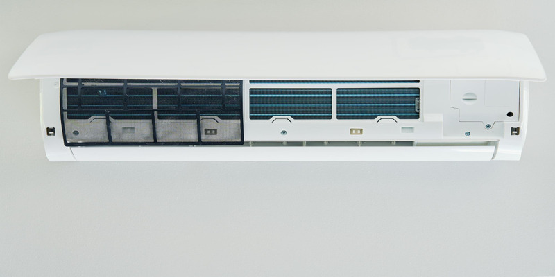 Indoor mini split air conditioner with the front panel open showing air filters
