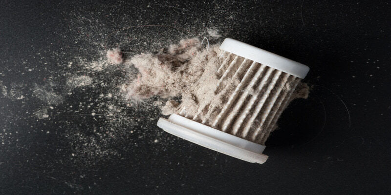 Dirty filter showing the effectiveness of a Smart Air Purifier against allergens.