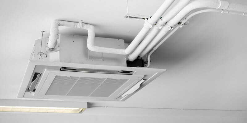Ceiling-mounted split HVAC unit inside a building
