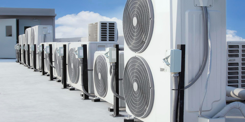 Commercial air conditioning outdoor units on building roof