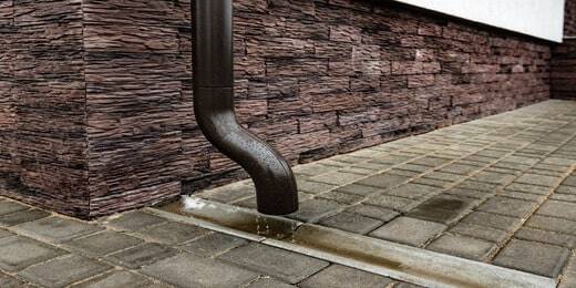 drain-pipe-brown-brick-wall-downspout (1)-min