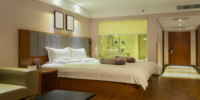 Hotel room with centralized HVAC control and modern climate system