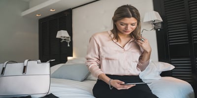 Hotel guest using app for room climate control