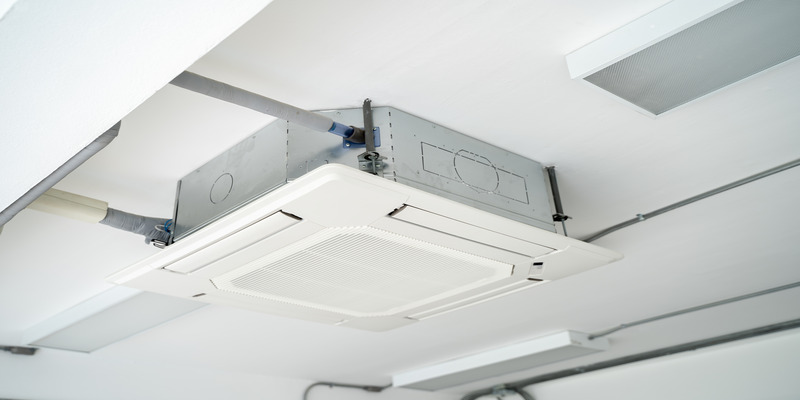 An air conditioning system installed in a school building on the ceiling.
