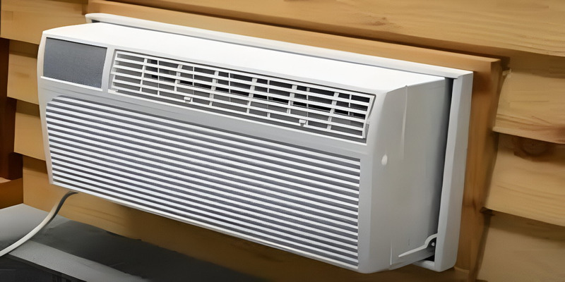 Through-the-wall air conditioner unit mounted in wall sleeve