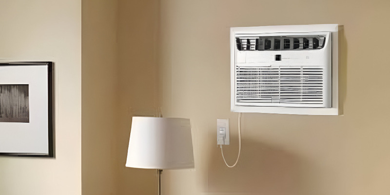 Through-the-wall air conditioner installed in a living room wall